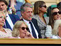 Hugh Grant falls asleep at Wimbledon tennis match while seated behind Queen Camilla