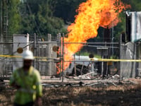 Human remains are found inside an SUV that officials say caused pipeline fire in suburban Houston