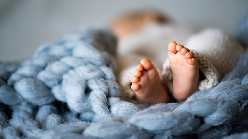 newborn feet istock