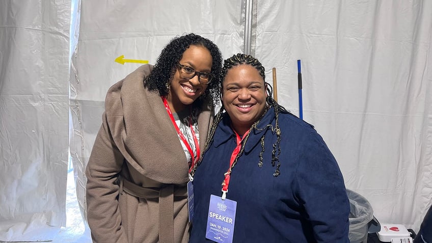 two women smiling