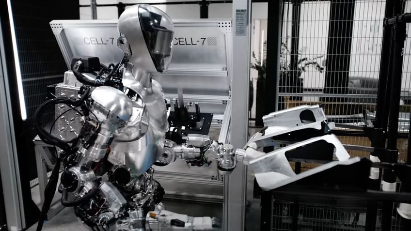 Humanoid robot gets to work in BMW assembly plant