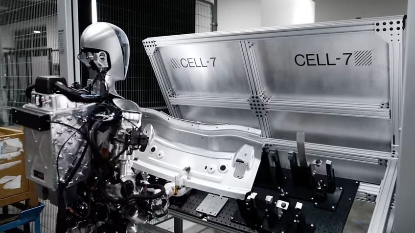 Humanoid robot gets to work in BMW assembly plant