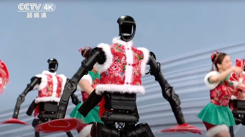 Humanoid robots bust dance moves alongside humans