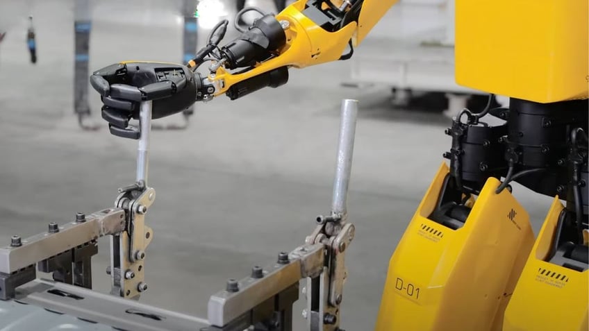 Forerunner K2 "Bumblebee" humanoid robot at the SAIC-GM automotive plant.