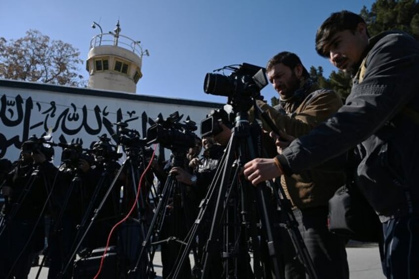 Afghanistan's journalists say they are frequently rounded up for covering attacks by milit