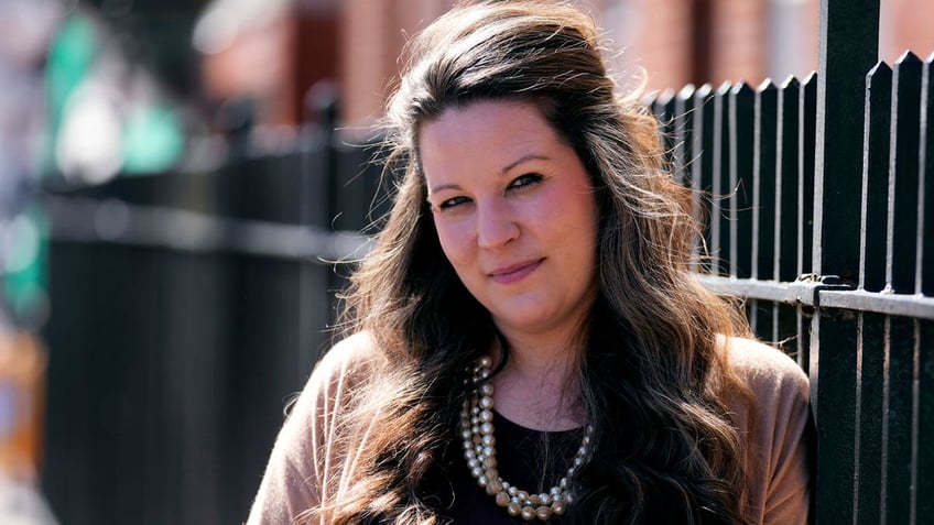 Kristin Fritz, a plaintiff in a lawsuit against Dr. Derrick Todd, poses for a portrait