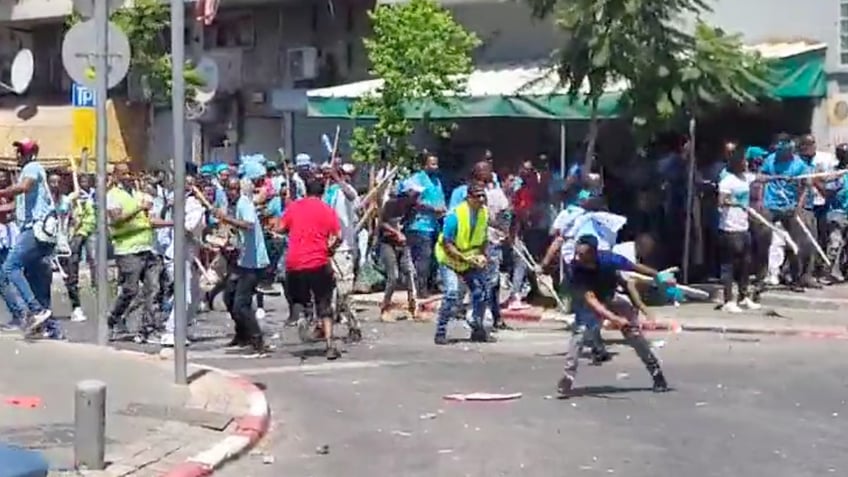 hundreds of african migrants get into mass brawl leading to blood stained streets in israel