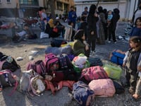 Hundreds of fleeing families sleep on beaches and streets after Israel’s strikes shake Beirut