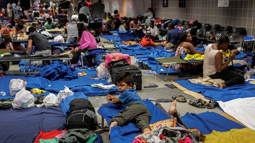 hundreds of migrants live inside chicago ohare international airport as city grapples with how to house them