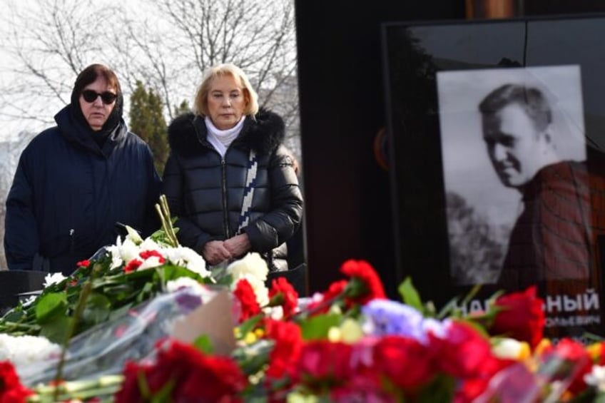 Lyudmila Navalnaya (L) visited her son's grave at the Borisovo cemetery in southern Moscow