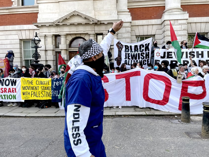 Protesters gather outside the Business and Trade department in London to show solidarity with Palestine, as they campaign against military arms being manufactured in the UK and sent to Israel. Picture date: Wednesday May 1, 2024. (Photo by Elena Giuliano/PA Images via Getty Images)