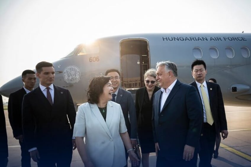 Orban was greeted at the airport by Chinese foreign ministry spokeswoman Hua Chunying