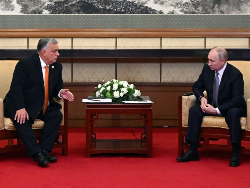 hungarys orban calls for ukraine ceasefire during meeting with vladimir putin in beijing