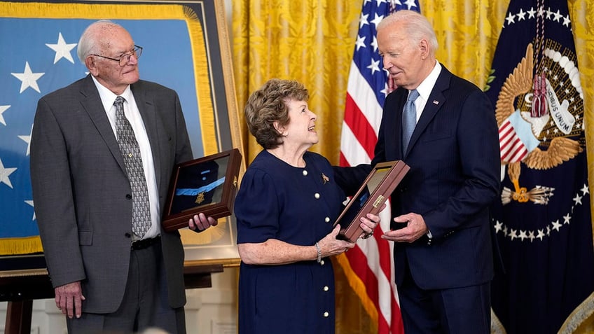 President Biden presents the Medal of Honor to Theresa Chandler, the great great granddaughter of Pvt. George D. Wilson.
