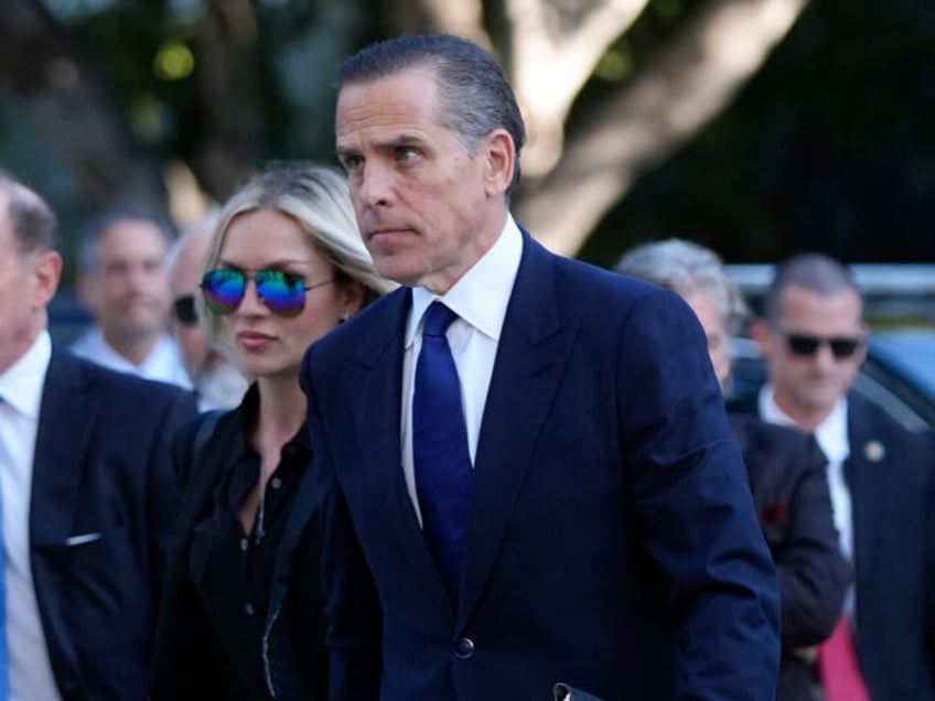 Hunter Biden, right, and his wife Melissa Cohen Biden, arrive in federal court for jury se