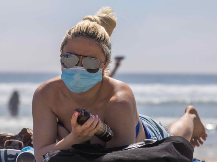 huntington beach california bans new mask vaccine mandates