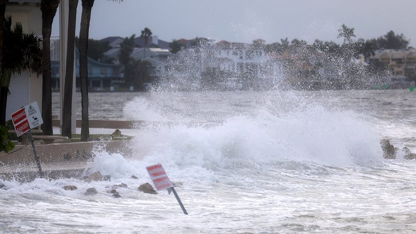 Waves from the Gulf of Mexico crash on shore as Hurricane Helene churns offshore on September 26, 2024, in St. Pete Beach, Florida. 