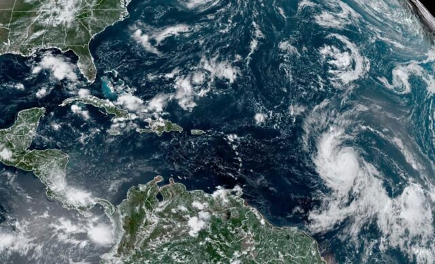 hurricane lee charges through open atlantic waters as it approaches northeast caribbean