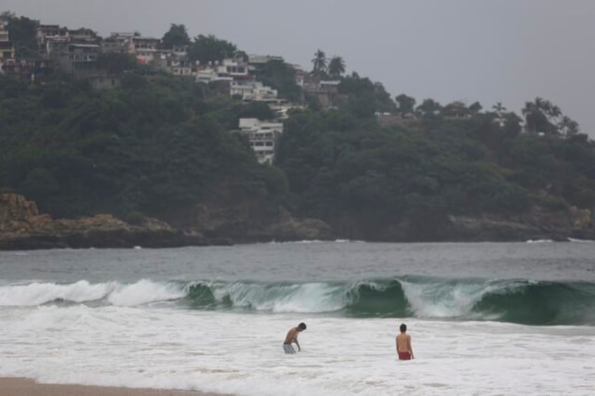 hurricane otis weakens over southern mexico after battering acapulco