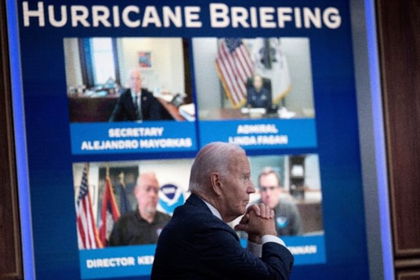 US President Joe Biden listens during a briefing about Hurricane Milton on October 9, 2024