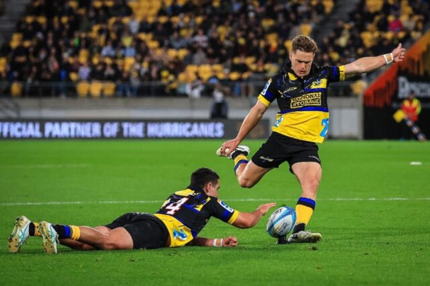 Wellington Hurricanes' fly-half Brett Cameron is relishing facing All Blacks playmaker Dam