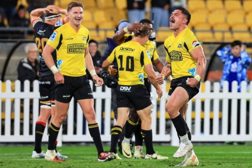 All Blacks centre Jordie Barrett (L) captains the Wellington Hurricanes on Friday at the W