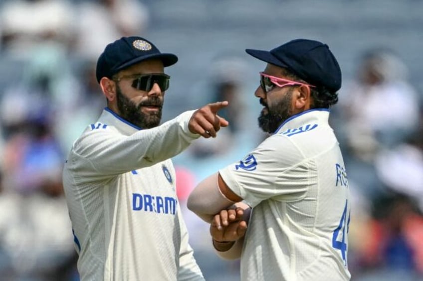 India's Virat Kohli (L) and Rohit Sharma (R) are under pressure heading into a five Test s