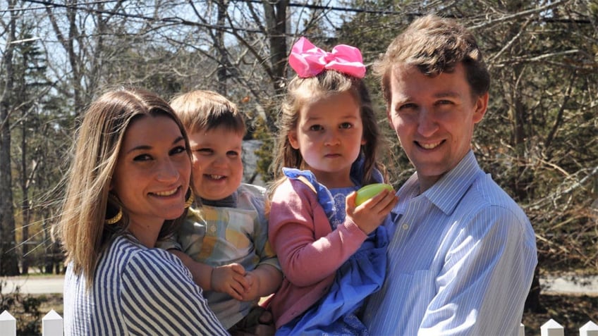 clancy family smiling for photo