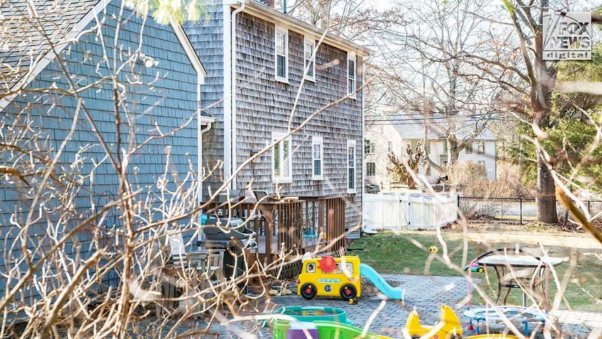 Lindsay Clancy's backyard, filled with children's toys.