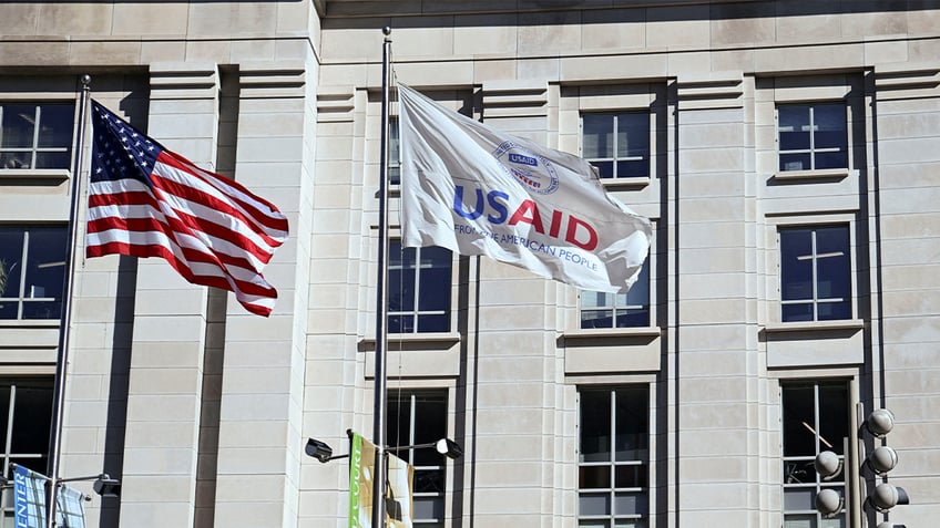 A USAID flag flies outside headquarters in Washington, D.C.