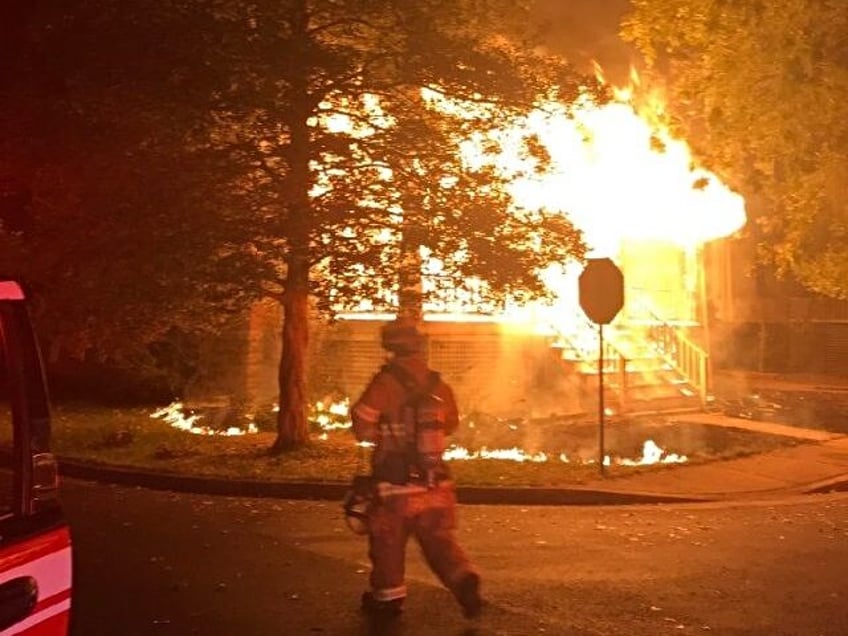 A house in Arlington, Virginia, exploded Monday night after the suspect inside of it fired