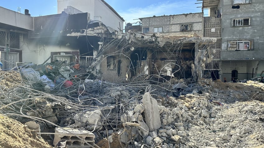 A view of destroyed roads and Kamal Adwan Hospital