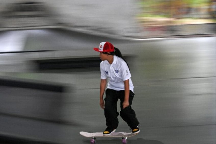 Thailand's 12-year-old skateboarder Vareeraya Sukasem trains at Hua Mak skate park in Bang