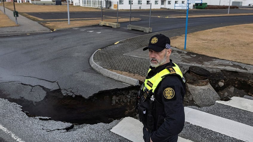 iceland dispatches bulldozer to build volcano defenses as fears persist of imminent eruption