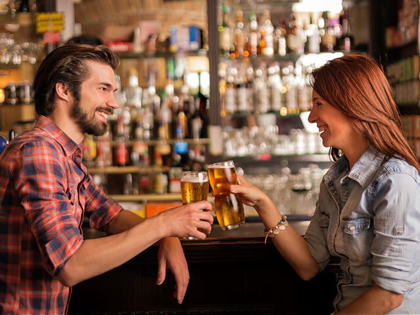 Young people drinking alcohol - stock photo