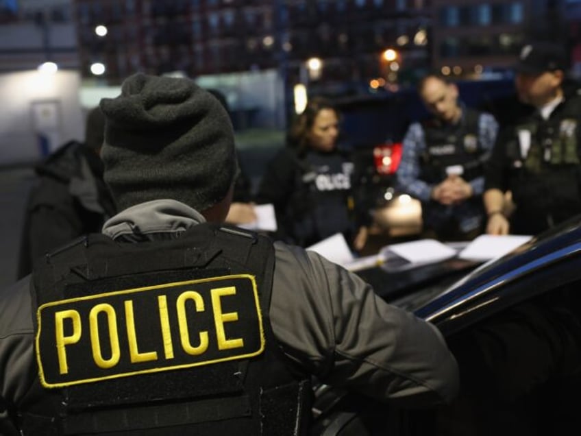 NEW YORK, NY - APRIL 11: U.S. Immigration and Customs Enforcement (ICE), officers prepare