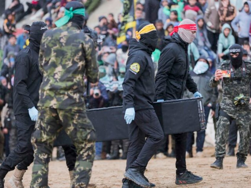 Hamas hostage coffin (Abood Abusalama / Middle East Images/AFP via Getty)