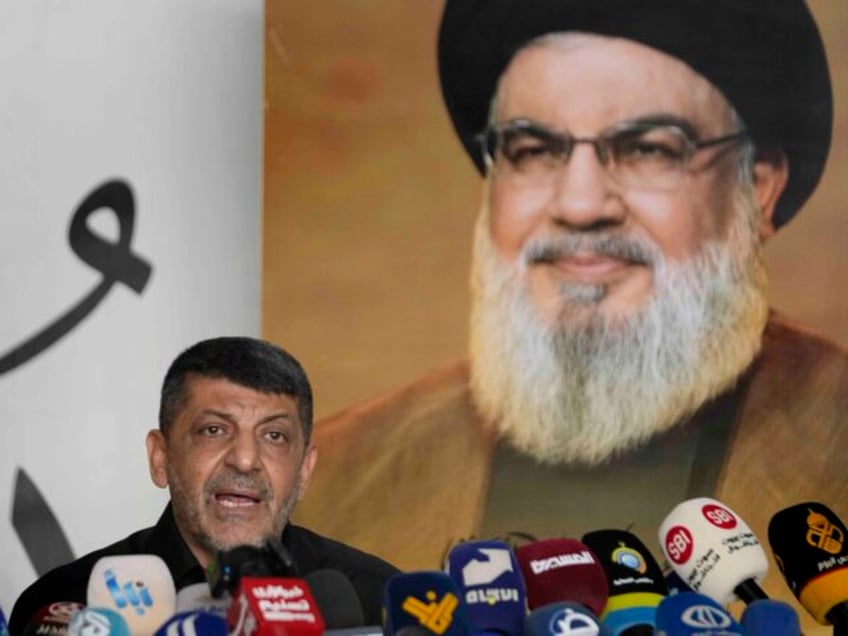 FILE - Hezbollah's chief spokesman Mohammed Afif speaks during a press conference in