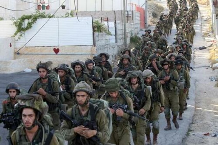 idf prepares ground invasion of lebanon calls up reserve brigades