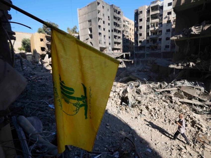 A Hezbollah flag at the site of the assassination of Hezbollah leader Hassan Nasrallah in