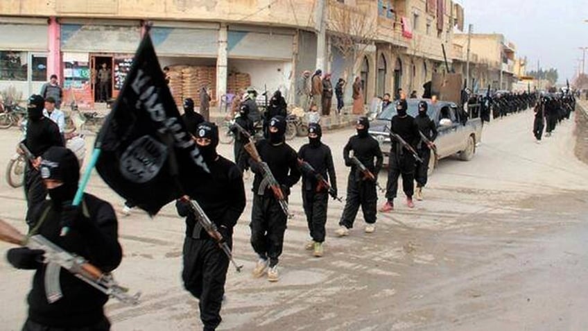 ISIS militants with flag