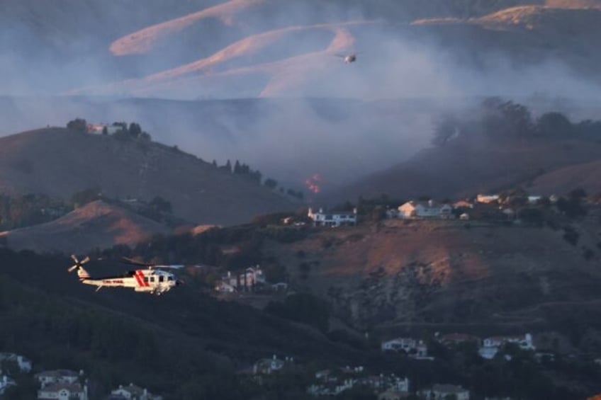 Air operations over the fire zones have to be halted if illegal drones are in the area