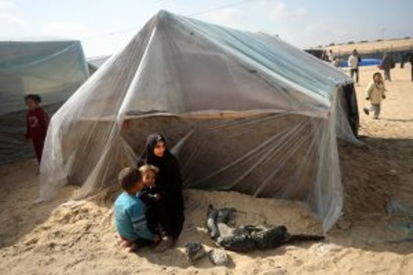 Illegal Israeli settlers throw stones and tear gas Palestinians in the West Bank