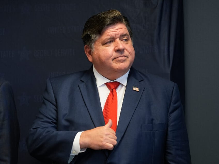 Illinois Gov. JB Pritzker speaks during a Democratic National Convention security briefing