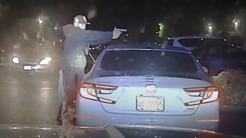 illinois state police dashcam captures moment chicago murder suspect fires shots at officer