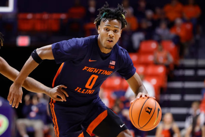 Terrence Shannon Jr. #0 of the Illinois Fighting Illini drives to the basket in the game against the Valparaiso Crusaders at State Farm Center on...