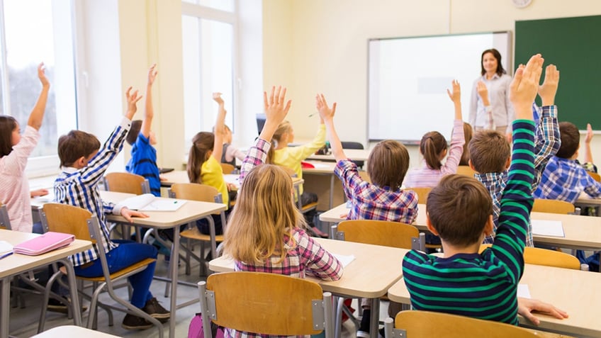 classroom hands raised