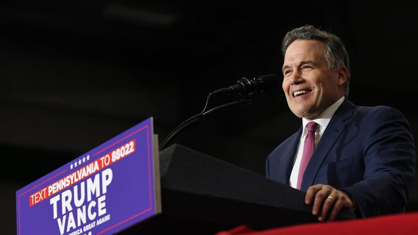 Dave McCormick, Pennsylvania Republican candidate for the U.S. Senate, speaks during Republican presidential nominee, former U.S. President Donald Trump's campaign rally at Riverfront Sports on October 9, 2024, in Scranton, Pennsylvania. (Photo by Michael M. Santiago/Getty Images)