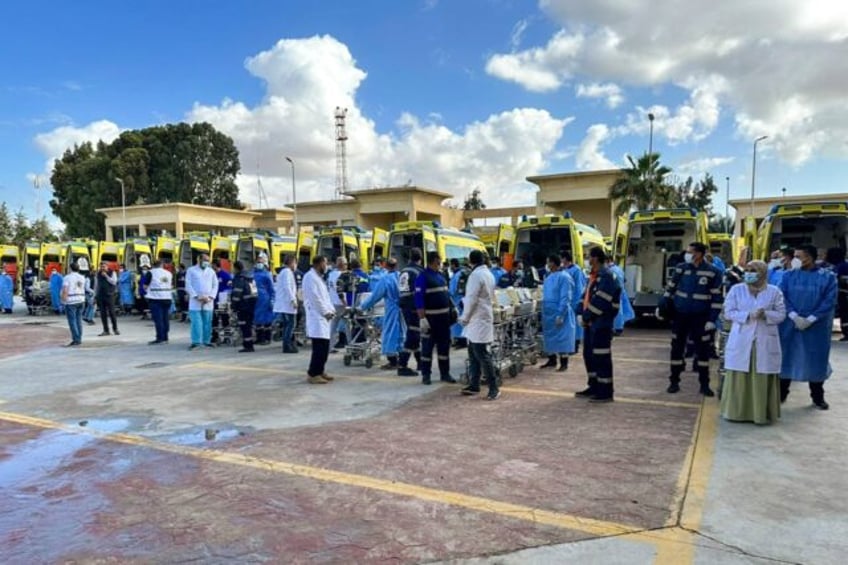 Egyptian medics prepare to receive premature babies evacuated from Gaza at the Rafah crossing on November 20