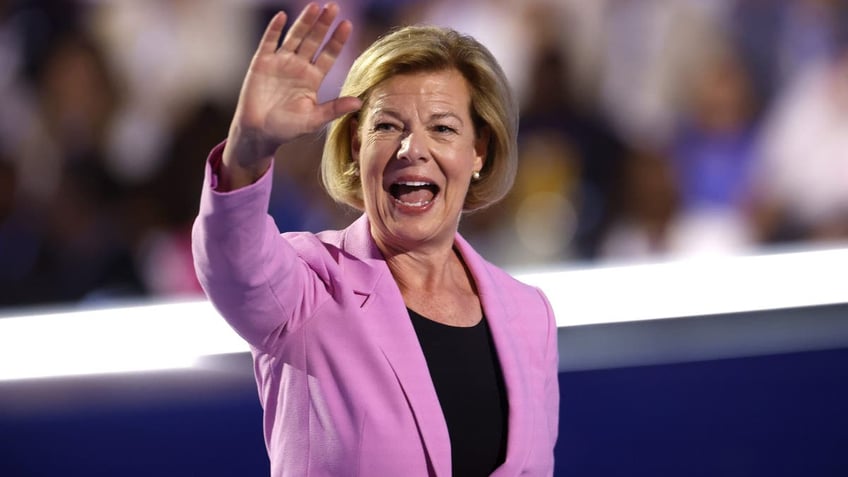 Wisconsin Democratic Sen. Tammy Baldwin departs after speaking on stage during the final day of the Democratic National Convention at the United Center on August 22, 2024 in Chicago, Illinois. 